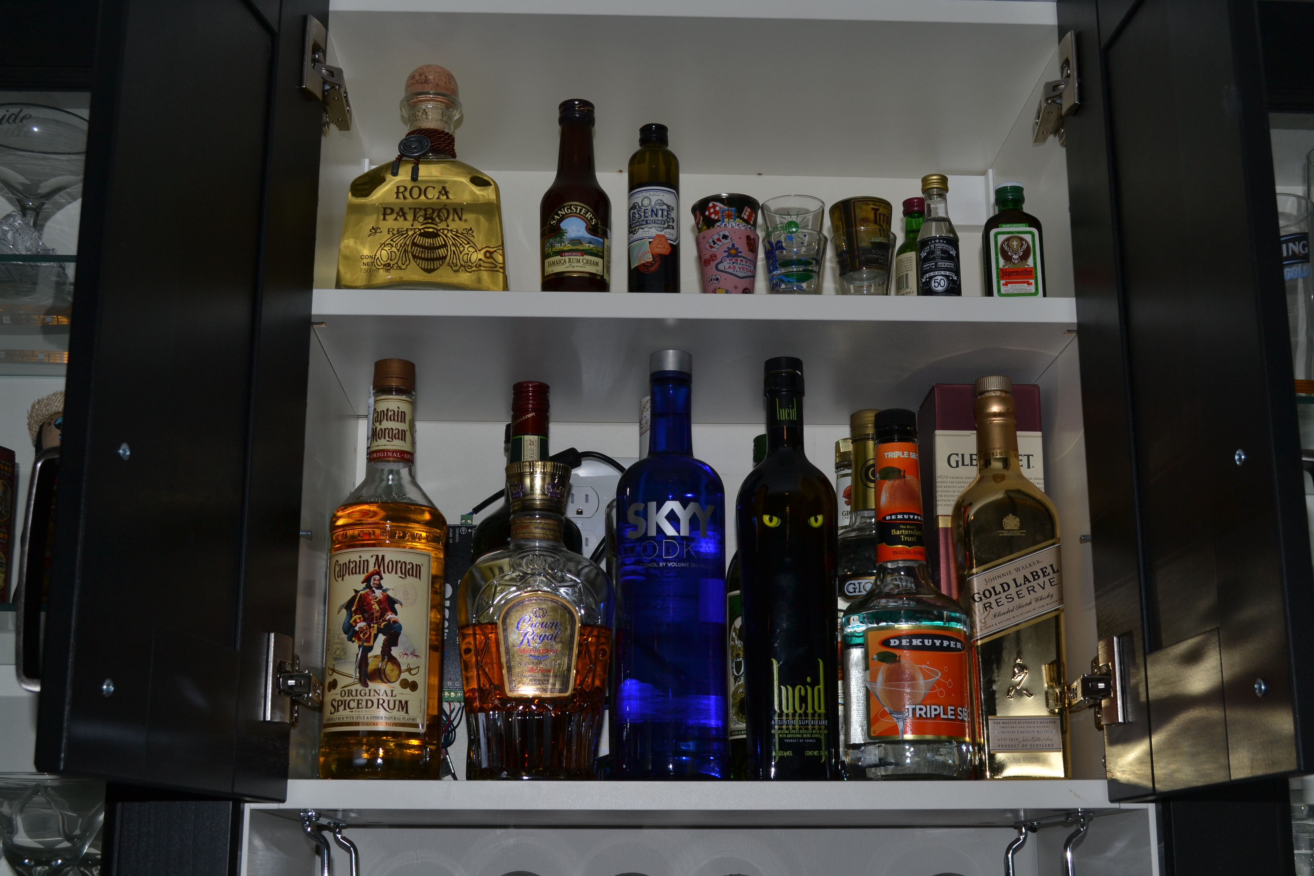 liquor out of sun cabinet after